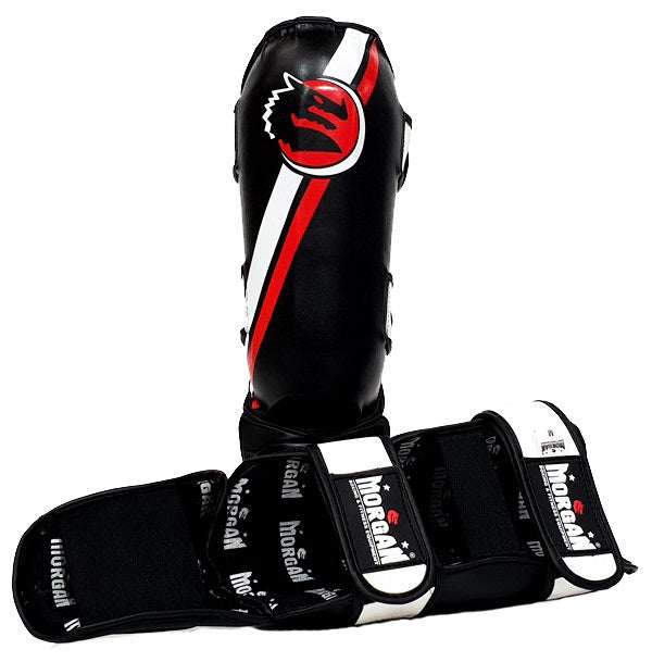 High-density shin guards with latex inner padding, contoured foam, pre-curved wraparound design, and secure fit.