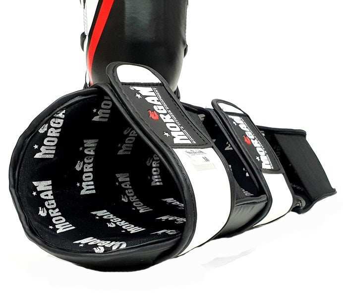 High-density latex shin guards with wraparound design and contoured foam technology.